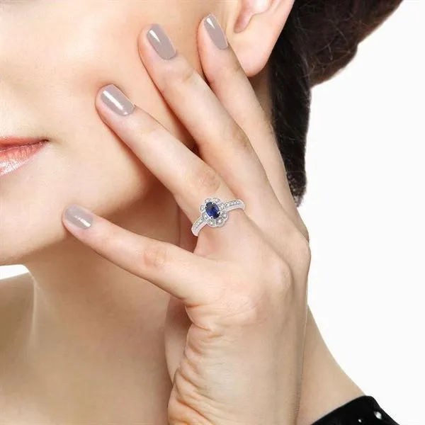 6x4mm Oval Cut Sapphire and 1/6 Ctw Single Cut Diamond Ring in 10K White Gold Image 4 Becker's Jewelers Burlington, IA