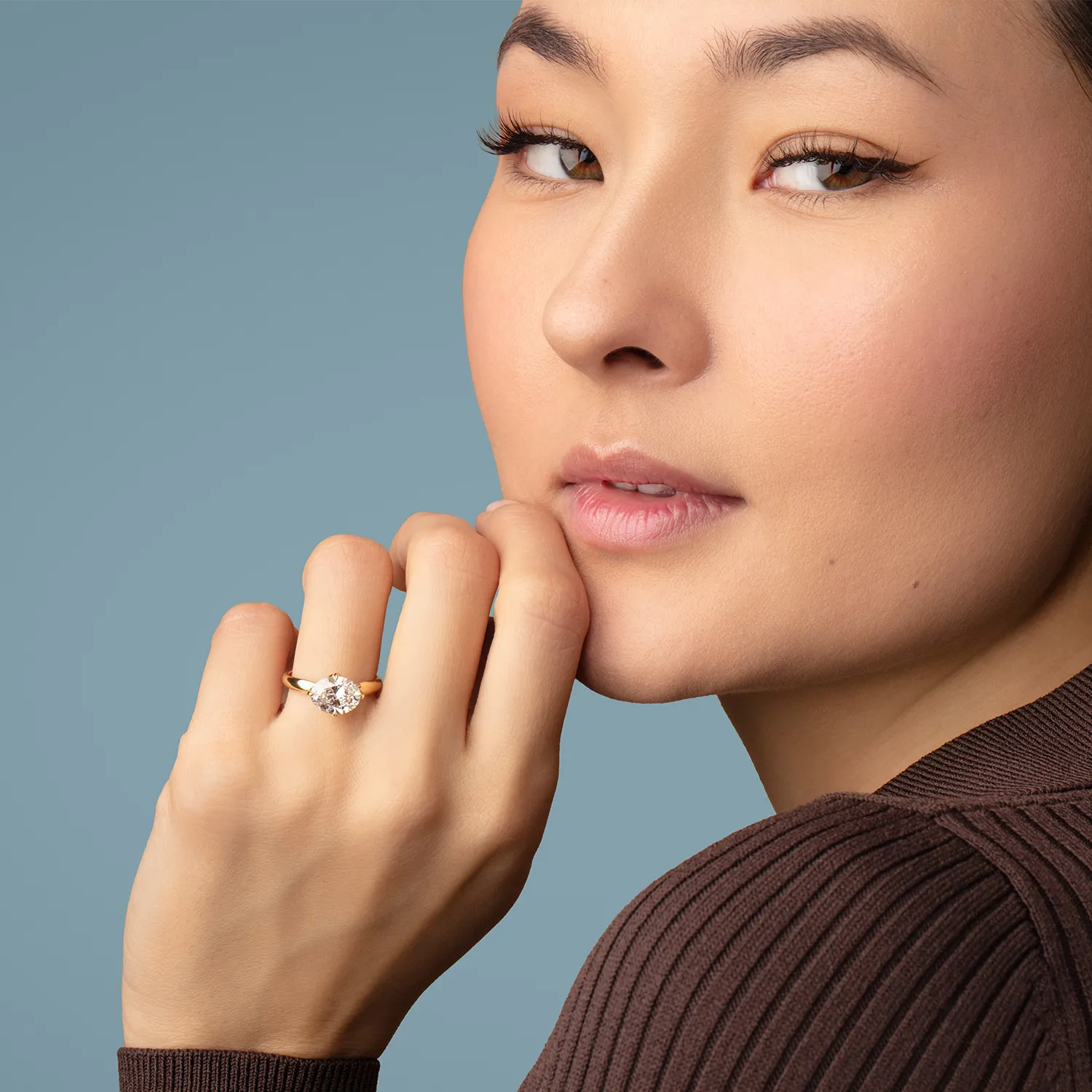 Model wearing the Yellow Gold Oval Solitaire Diamond Engagement Ring