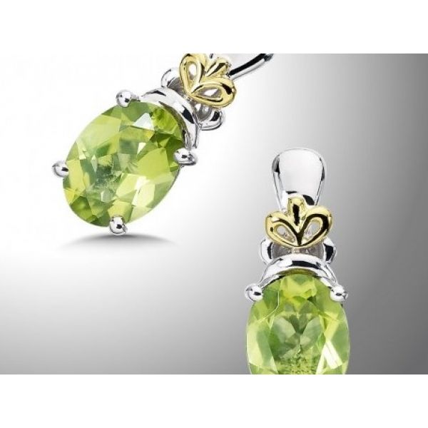 Rhodium Sterling Silver & 18KY Fashion Earrings with Two 8x6mm Oval Peridots. Post Backs. Barnes Jewelers Goldsboro, NC