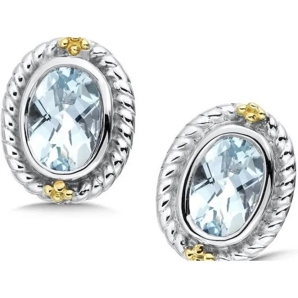 Rhodium Sterling Silver & 18KY Stud Earrings w/ Two 7x5mm  Oval Aquamarines. Barnes Jewelers Goldsboro, NC