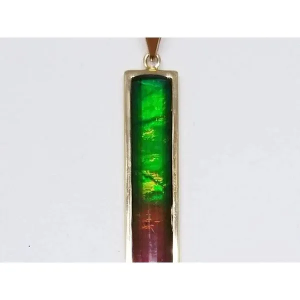 14K Yellow, Ammolite Pendant, faceted, Rectangle, 7mm x 28mm   Pendant only. Barnes Jewelers Goldsboro, NC