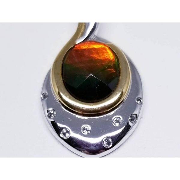 Rhodium Sterling Silver & Gold Pendant w/ apx 8mm x 11mm Faceted Ammolite Barnes Jewelers Goldsboro, NC