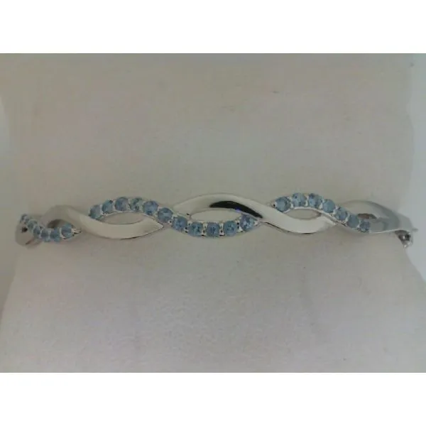 Rhodium  Sterling Silver Bangle Bracelet, hinged,  w/ Blue Topaz 0.72w. Barnes Jewelers Goldsboro, NC