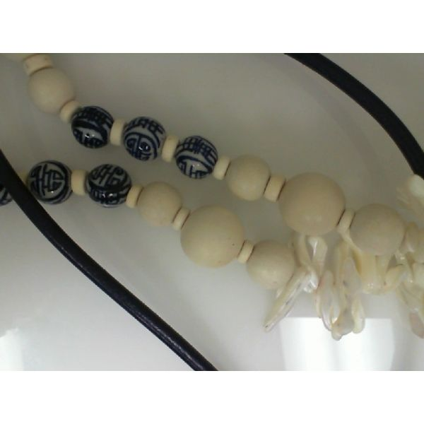 Necklace w/ Blue Leather cord,  White Wood Beads,  Blue & white Porcelain Beads and Mother of Pearl beads, apx. 40