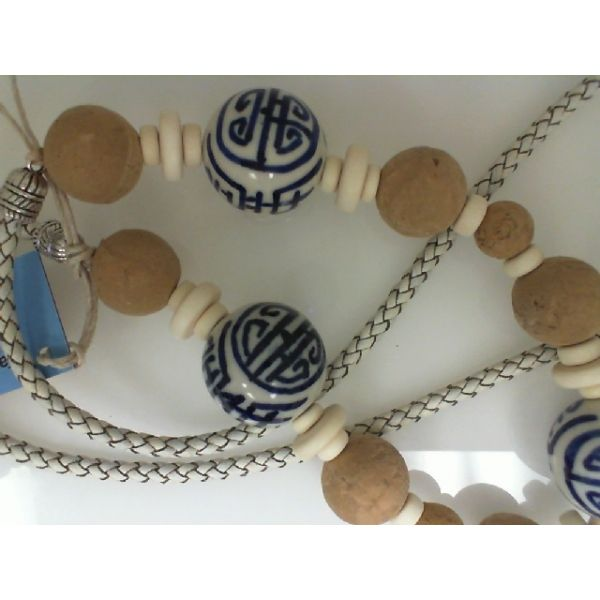 White leather Cord w/ Wood, Cork and Porcelain Beads. apx 40