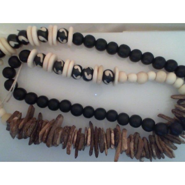 Necklace w/ Assorted Wood, Bone, and Coconut Beads    apx 35