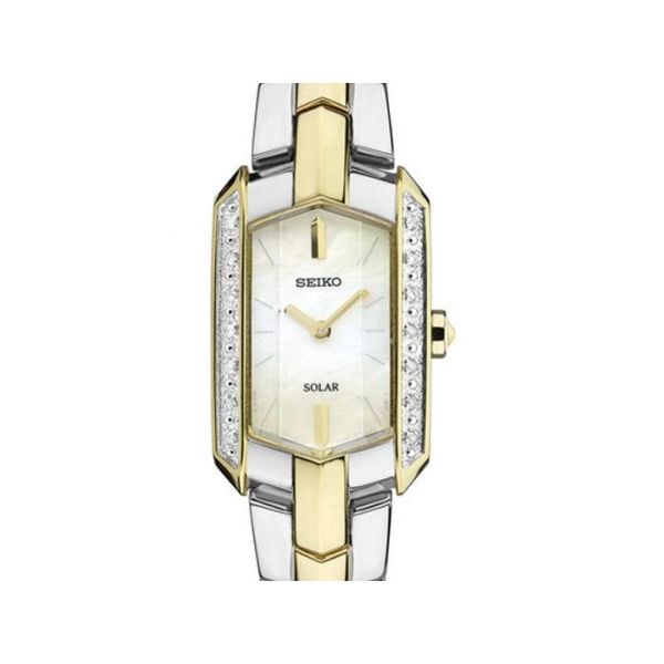 Ladies Tressia Solar Watch ,  Stainless steel with goldtone Accents,  Mother of Pearl Dial with 14 Diamonds, 15.5 mm. 12 month p Barnes Jewelers Goldsboro, NC