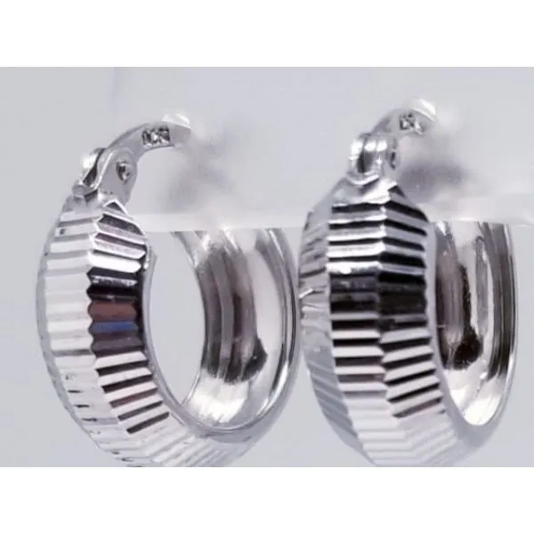 Sterling Silver Faceted Huggie Earrings. 15.4mm x 6.5mm apx. Barnes Jewelers Goldsboro, NC