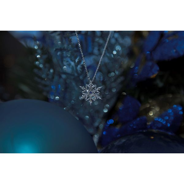 Tahoe Snowflake in White Gold with White Diamonds and a Blue Sapphire Center Double Diamond Jewelry Olympic Valley, CA