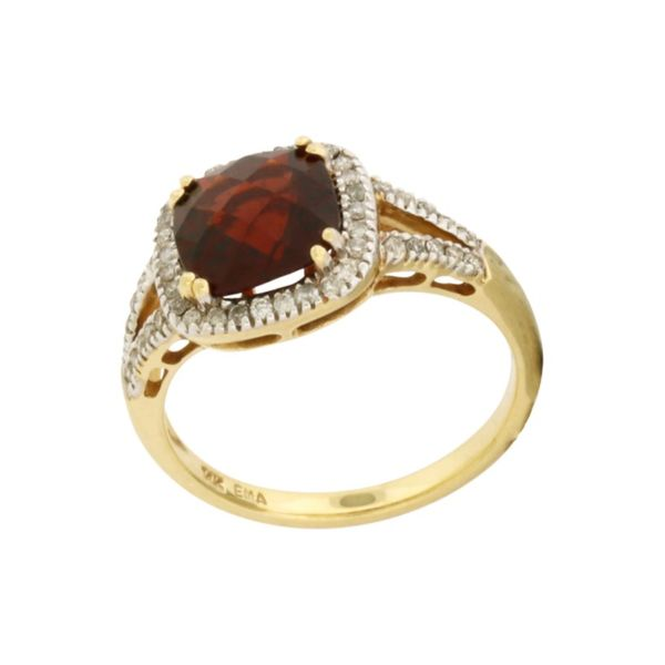 Garnet and diamond halo style ring. Holliday Jewelry Klamath Falls, OR