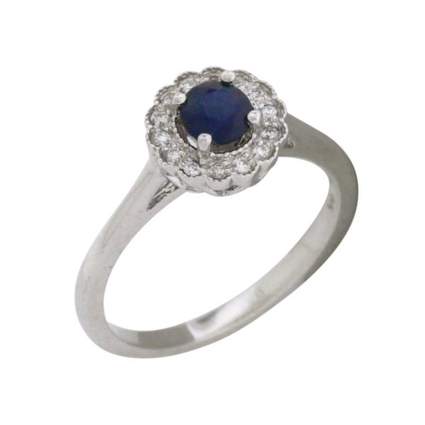 Elegant sapphire and diamond halo style ring. Holliday Jewelry Klamath Falls, OR