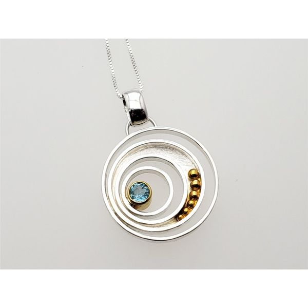 Sterling silver and vermeil pendant and chain with sky blue topaz Roberts Jewelers Jackson, TN