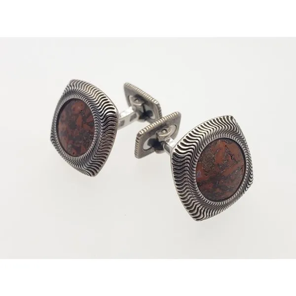 Apatosaurus dinosaur fossil cufflink with stainless and sterling silver Roberts Jewelers Jackson, TN