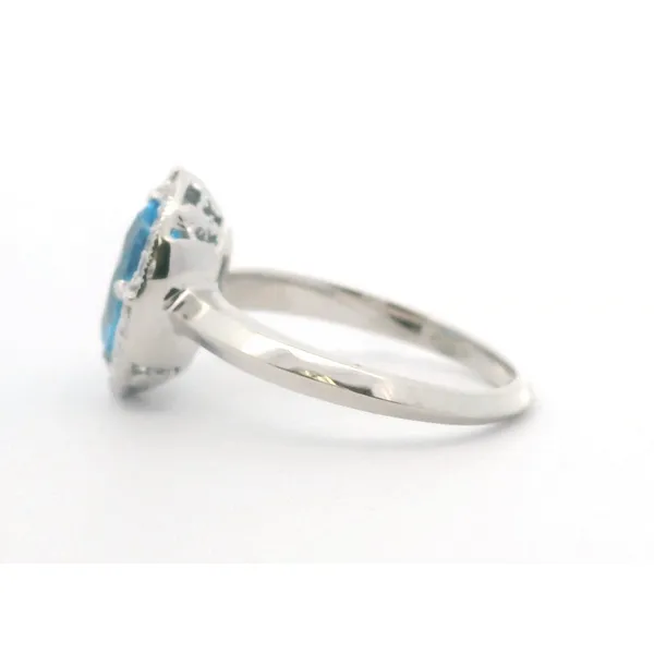 14kt White Gold Blue Topaz and Diamond Halo Ring