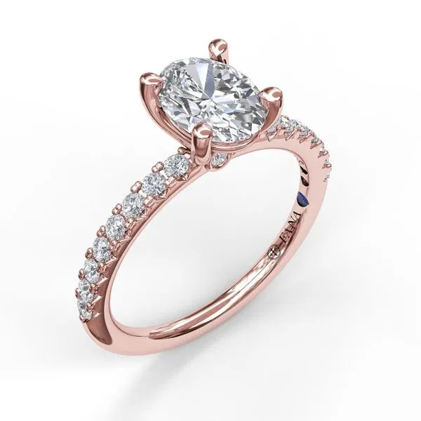Classic Single Row Engagement ring with an Oval Center Diamond. Steve Lennon & Co Jewelers  New Hartford, NY
