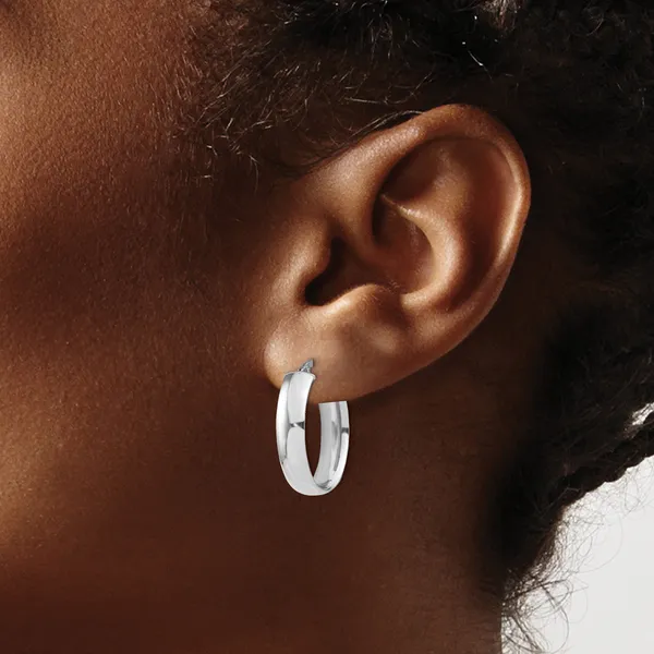 Leslie's 14k with White Rhodium Plating 6mm Polished Oval Hoop Earrings Image 3 Spencer's Jewelers Athens, GA