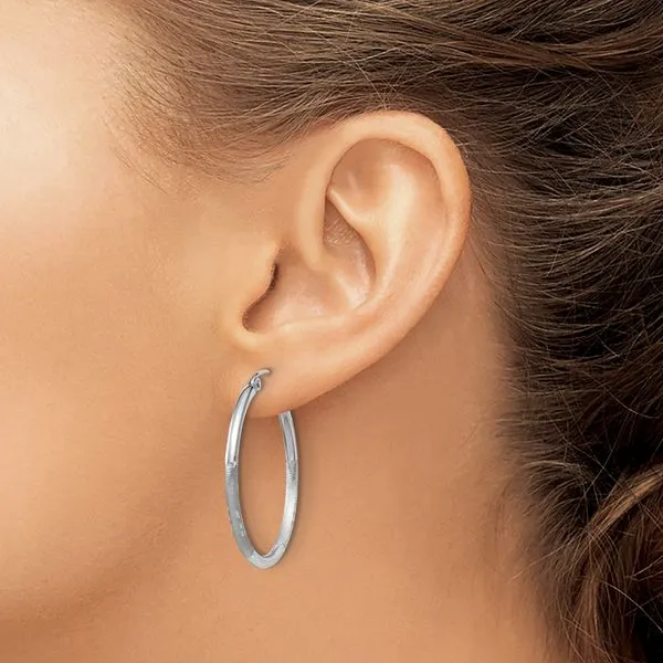Leslie's 14k White Gold Satin and D/C 2mm Round Hoop Earrings Image 3 Spencer's Jewelers Athens, GA