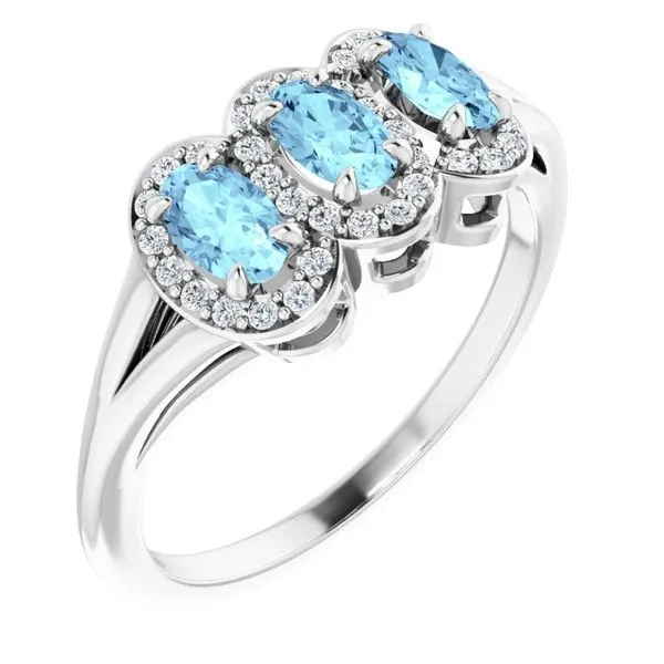 Halo-Style Three-Stone Ring James Wolf Jewelers Mason, OH