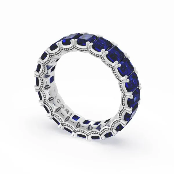 Emerald Cut Blue Sapphire Eternity Band in 18kt White Gold Aires Jewelers Morris Plains, NJ