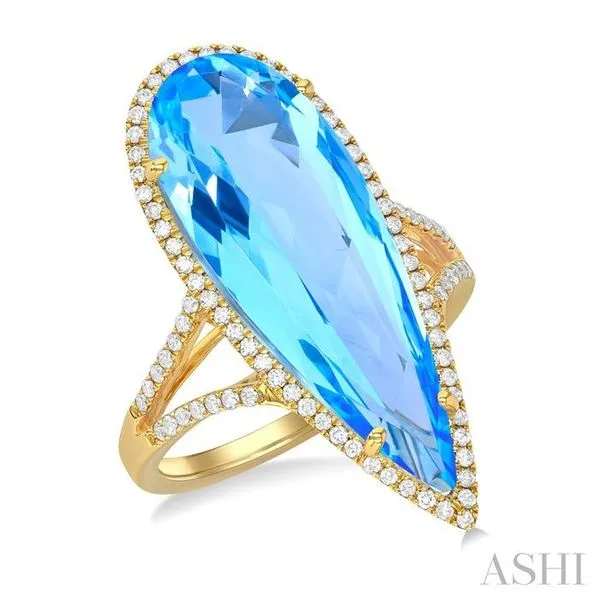 26x9 MM Pear Shape Blue Topaz and 1/3 Ctw Round Cut Diamond Halo Semi-Precious Ring in 14K Yellow Gold Hart's Jewelers Grants Pass, OR