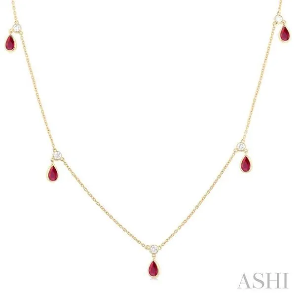 5x3 MM Pear Shape Ruby and 1/8 Ctw Round Cut Diamonds Precious Station Necklace in 10K Yellow Gold Hart's Jewelers Grants Pass, OR