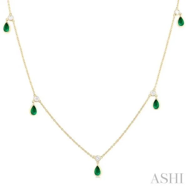 5x3 MM Pear Shape Emerald and 1/4 Ctw Round Cut Diamonds Precious Station Necklace in 14K Yellow Gold Hart's Jewelers Grants Pass, OR