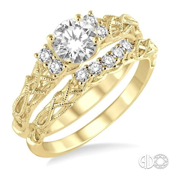 1/2 Ctw Diamond Wedding Set with 1/3 Ctw Round Cut Engagement Ring and 1/10 Ctw Wedding Band in 14K Yellow Gold Becker's Jewelers Burlington, IA
