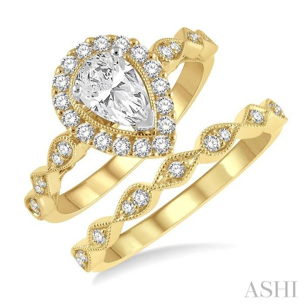 7/8 ctw Cutwork Diamond Wedding Set With 3/4 ctw Pear Cut Engagement Ring and 1/10 ctw Wedding Band in 14K Yellow and White Gold Chandlee Jewelers Athens, GA