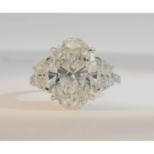 6.34Cttw Lab Grown Diamond Engagement Ring Featuring, 5.01Ct Brilliant Oval Set In 14Kt White Gold With Moon Cut Side Stones Albert's Jewelers Kingsland, GA