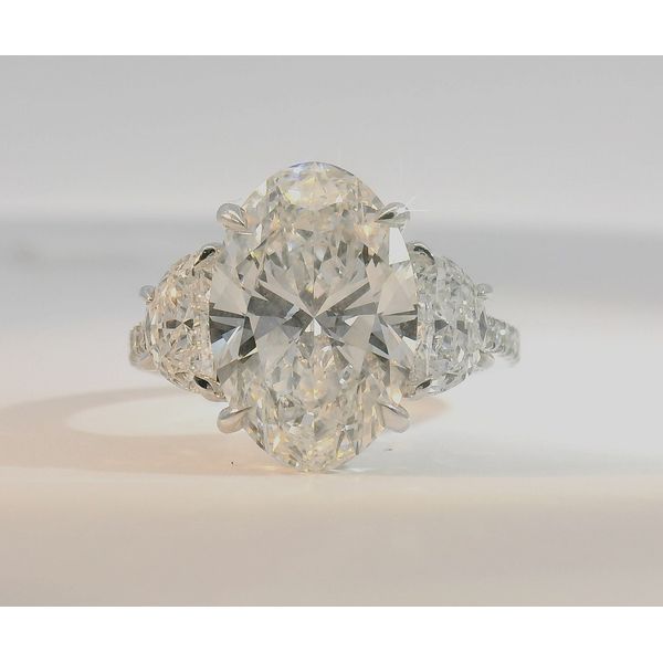 6.34Cttw Lab Grown Diamond Engagement Ring Featuring, 5.01Ct Brilliant Oval Set In 14Kt White Gold With Moon Cut Side Stones Albert's Jewelers Kingsland, GA