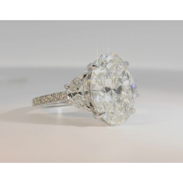 6.34Cttw Lab Grown Diamond Engagement Ring Featuring, 5.01Ct Brilliant Oval Set In 14Kt White Gold With Moon Cut Side Stones Image 2 Albert's Jewelers Kingsland, GA