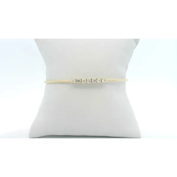 Diamonds & yellow gold make for a classic look in the perfect flex bangle! Image 2 Albert's Jewelers Kingsland, GA