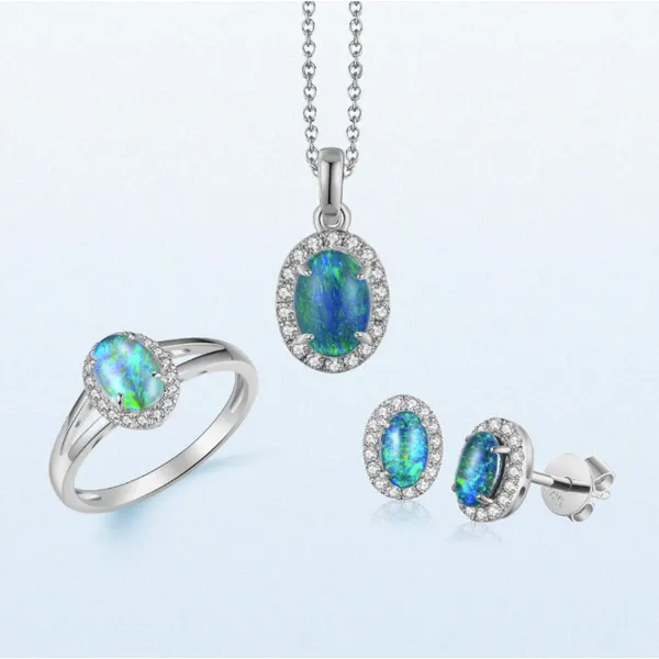 Soft and shimmering — this 14Kt White Gold Ring features a 0.61ct opal surrounded by a sparkling diamond halo for an elegant, romantic glow. Image 2 Albert's Jewelers Kingsland, GA