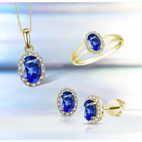Elegant and radiant — these 14Kt Yellow Gold Sapphire Halo Studs sparkle with rich blue sapphires and diamond accents for timeless beauty. Image 2 Albert's Jewelers Kingsland, GA