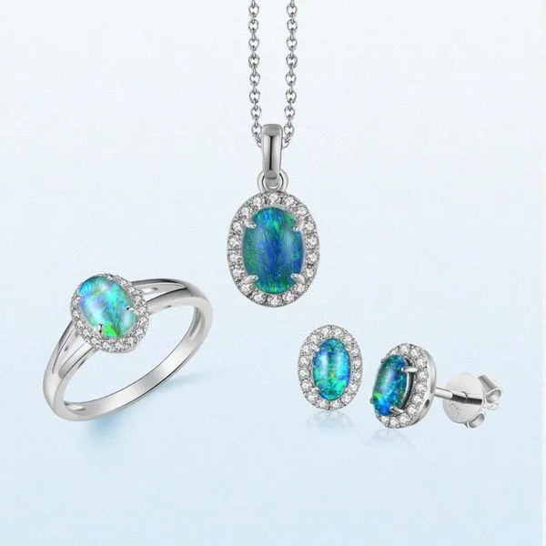 Dreamy and radiant — these 14Kt White Gold Opal Halo Studs shimmer with luminous opals and sparkling diamonds. Image 2 Albert's Jewelers Kingsland, GA