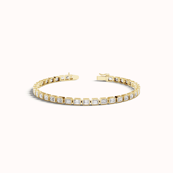 14 Karat Yellow Gold Bezel Set Emerald Cut Lab Grown Diamond Tennis Bracelet Arezzo Jewelers Elmwood Park, IL