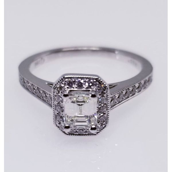 14 Karat White Diamond Ring With One Emerald cut Diamond  0.51 ct  G/H Clarity: SI1  and 0.26 tw diamonds. Ring Size 6.5 Barnes Jewelers Goldsboro, NC