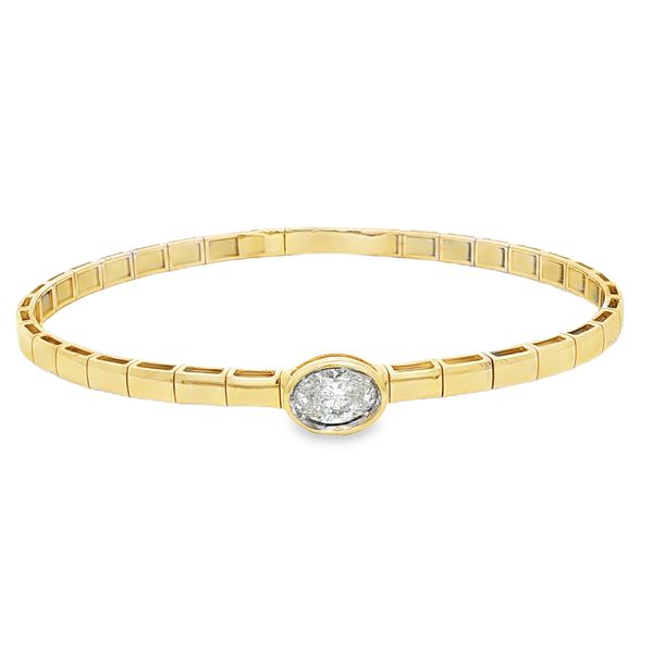Bezel Set Oval Diamond Solitaire Flex Bangle | 14KT Yellow Gold | Barnes Jewelers Goldsboro NC Barnes Jewelers Goldsboro, NC