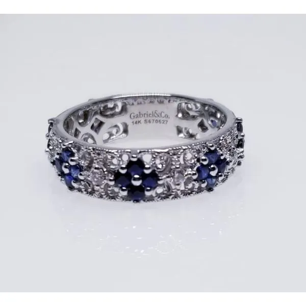 14K White Sapphire & Diamond Band. with 28 Round Blue Sapphires 0.98 tw and 6 Diamonds 0.12 tw. Size 6.5 Barnes Jewelers Goldsboro, NC