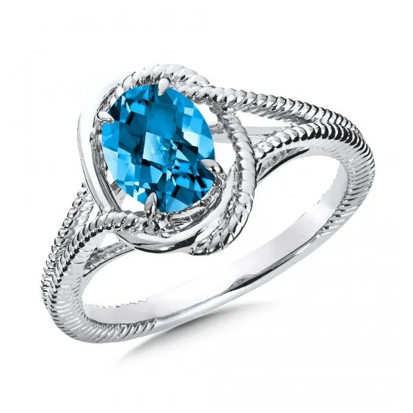 Rhodium Sterling Silver Ring with One 8x6mm Oval Blue Topaz. Size 7 Barnes Jewelers Goldsboro, NC