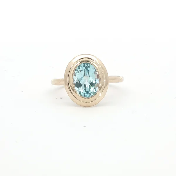 PARAGON  Bezel Set Swiss Blue Topaz Ring, 14KT Yellow Gold, 2.35TGW Oval Swiss Blue Topaz, Size 6.5  R0856SB-04 Barnes Jewelers Goldsboro, NC