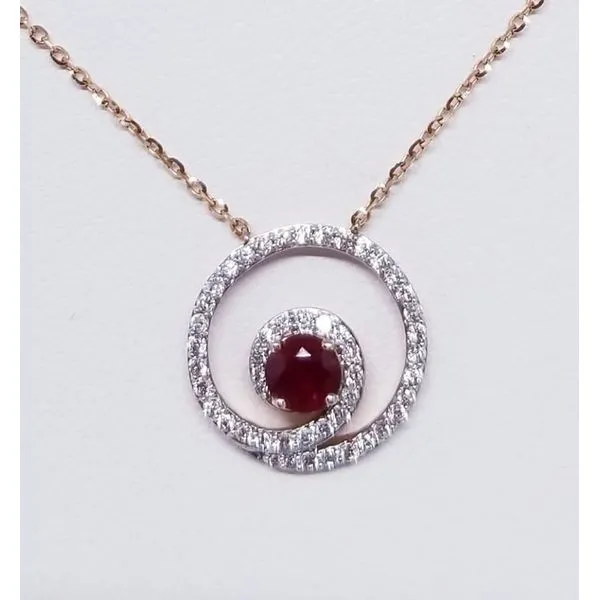 14 Karat Rosé Pendant with One Round Ruby  0.32ct in a 13mm Round Diamond Swirl 0.25tw.  14KR Cable  Chain-  Length Adjustable  Barnes Jewelers Goldsboro, NC