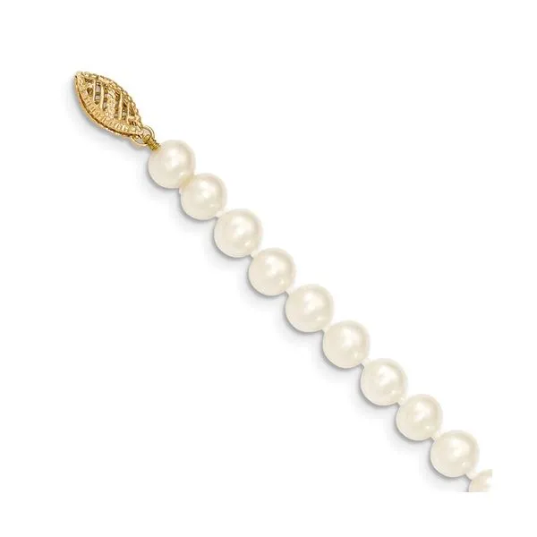 Pearl  Bracelet- 6-7mm  White  Cultured Freshwater Near Round Pearl Bracelet with 14KY Pearl Clasp. Length  7.5