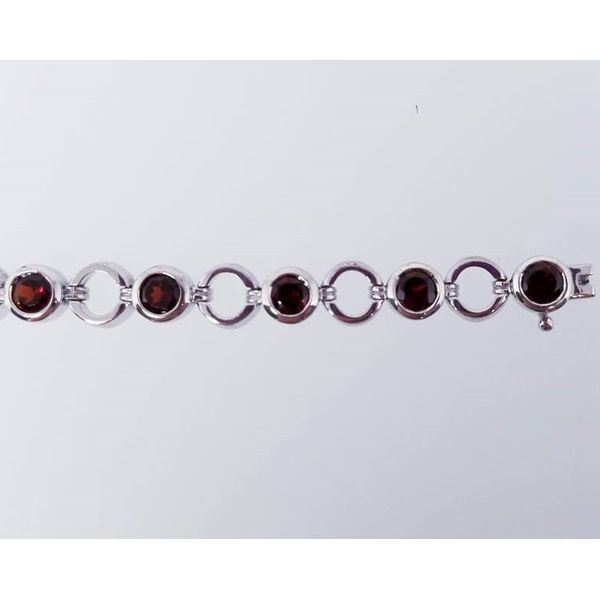 Rhodium Sterling Silver Garnet Bracelet with Twelve 5mm Round Garnets. 7.8ctw. Length 7