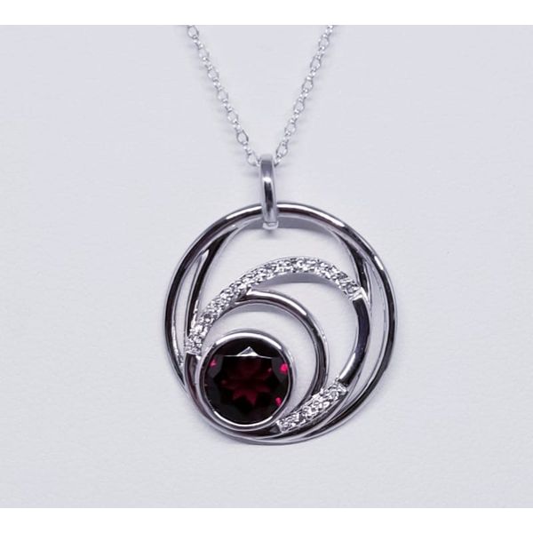 Rhodium Sterling Silver Fashion Pendant with One 2.48ct Garnet and 0.15tw White Topaz. Length 16