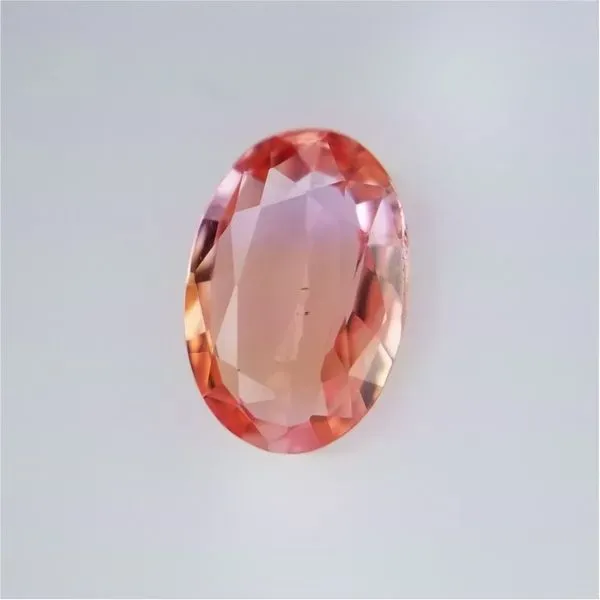 1.59ct Oval Cut Peach Padparadscha Sapphire Becky Beauchine Kulka Diamonds and Fine Jewelry Okemos, MI