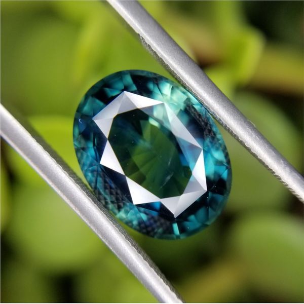 5.83ct Oval Cut Blue-Green Sapphire Becky Beauchine Kulka Diamonds and Fine Jewelry Okemos, MI