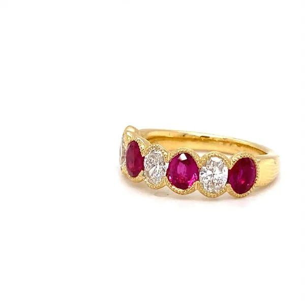 Regal Ruby and Diamond Eternity Band in 18K Yellow Gold Image 4 Biondi Diamond Jewelers Aurora, CO