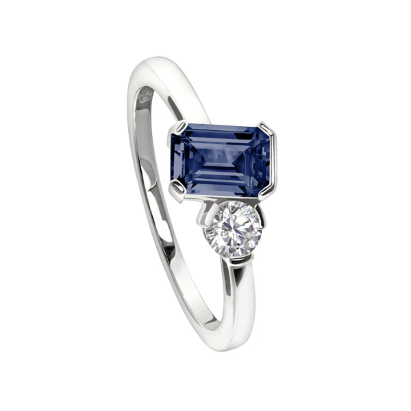 (September) Emerald Cut Similated Sapphire and a Round Similated Diamond Ring, Sterling Silver, Size 7 Blocher Jewelers Ellwood City, PA