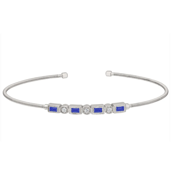 Sterling Silver Single-Cable Cuff Bracelet In Rhodium Finish. Featuring Alternating Simulated Emerald Cut Sapphires And Round Simulated Diamonds Blocher Jewelers Ellwood City, PA